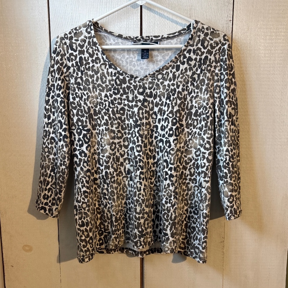 Woman’s cheetah print quarter sleeve shirt